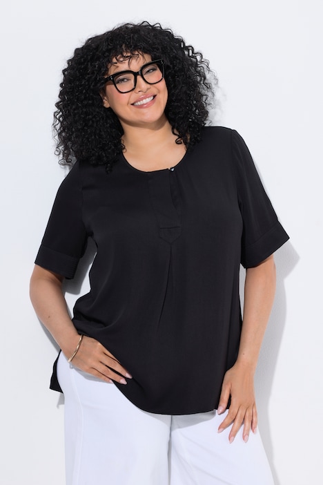 792119 - Blouse à empiècement matelassé. Manches courtes et coupé évasée